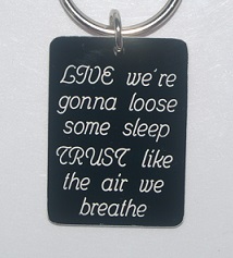 Plastic INXS Keyring BACK